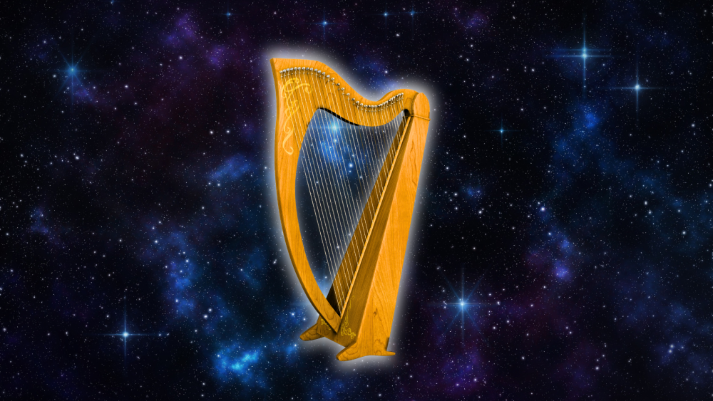 A glowing golden harp floats amid a glowing starfield